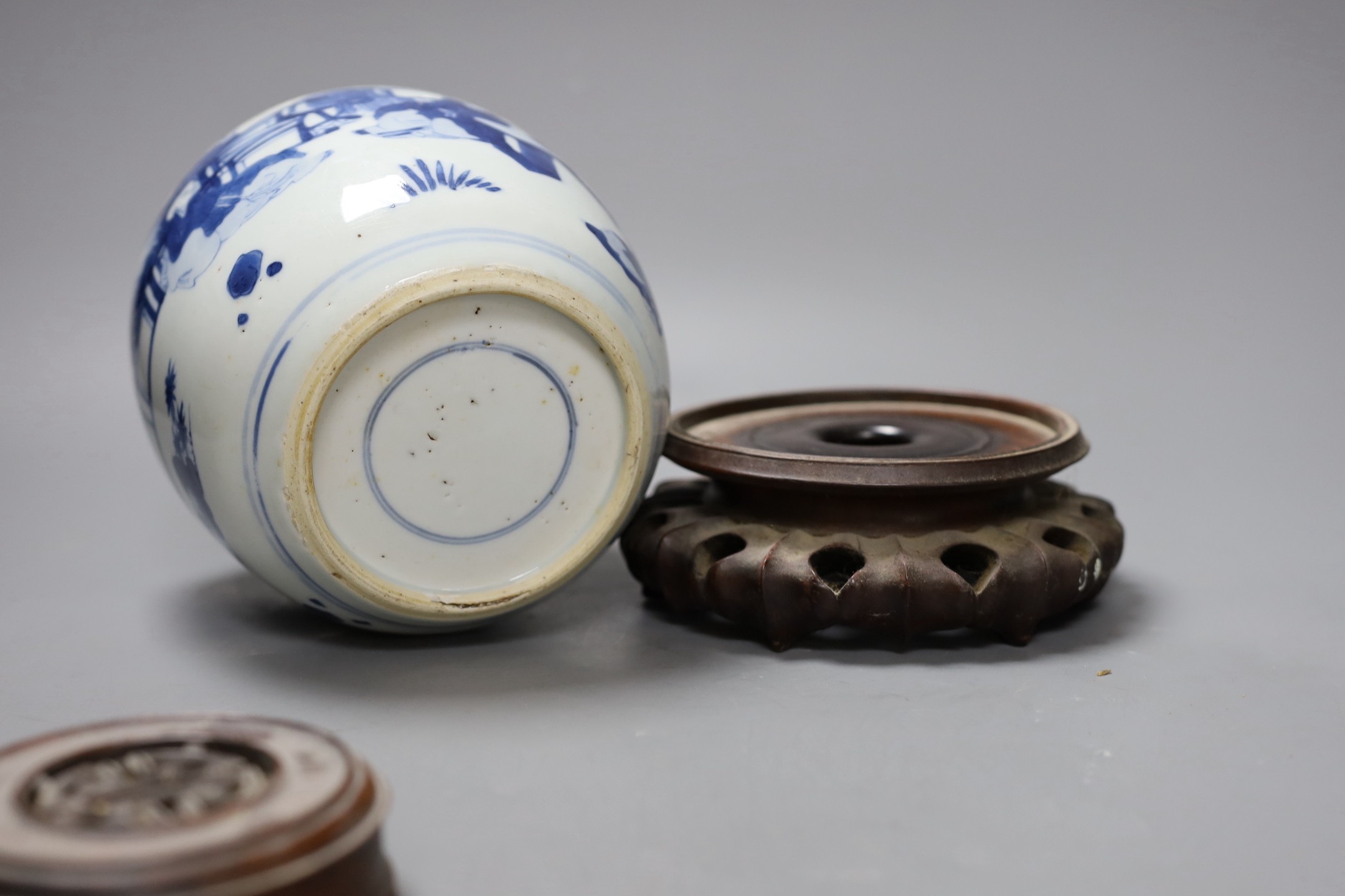A Chinese blue and white 'boys' jar, 19th century, wood cover and stand, total height 24cm high